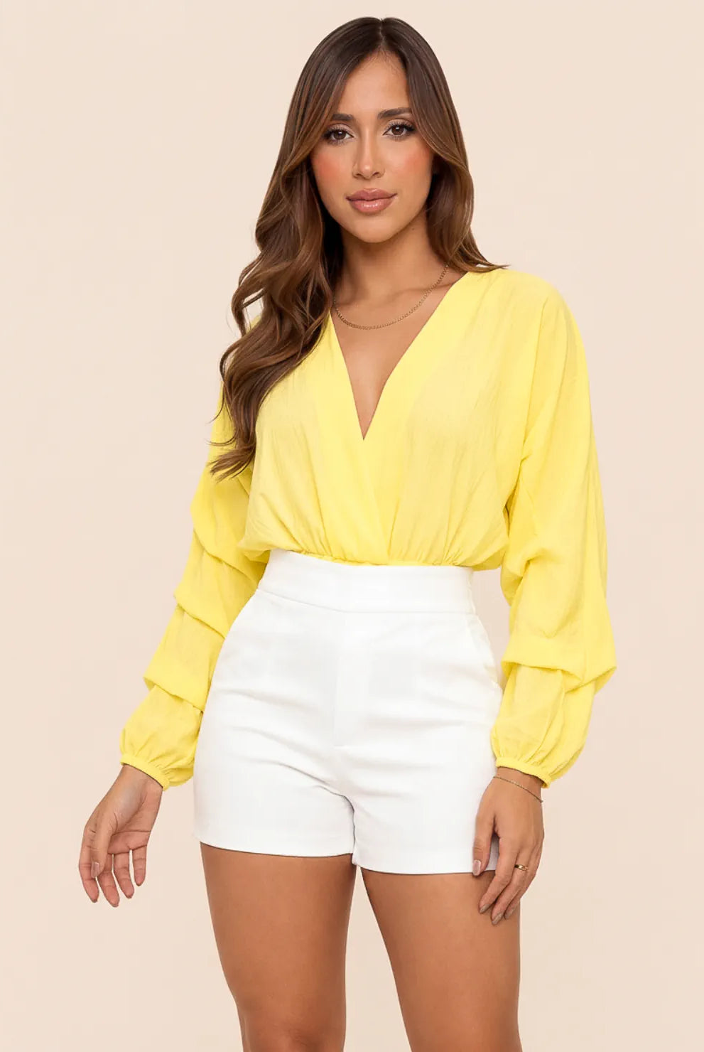 Blusa amarilla manga larga de tiempos con escote cruzado para mujer
